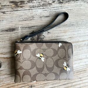 Coach Tan Wristlet with Bee Design